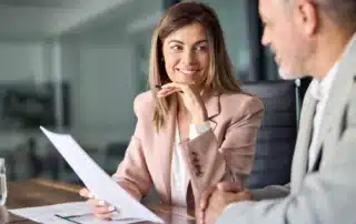 Happy employees working together in a modern office space
