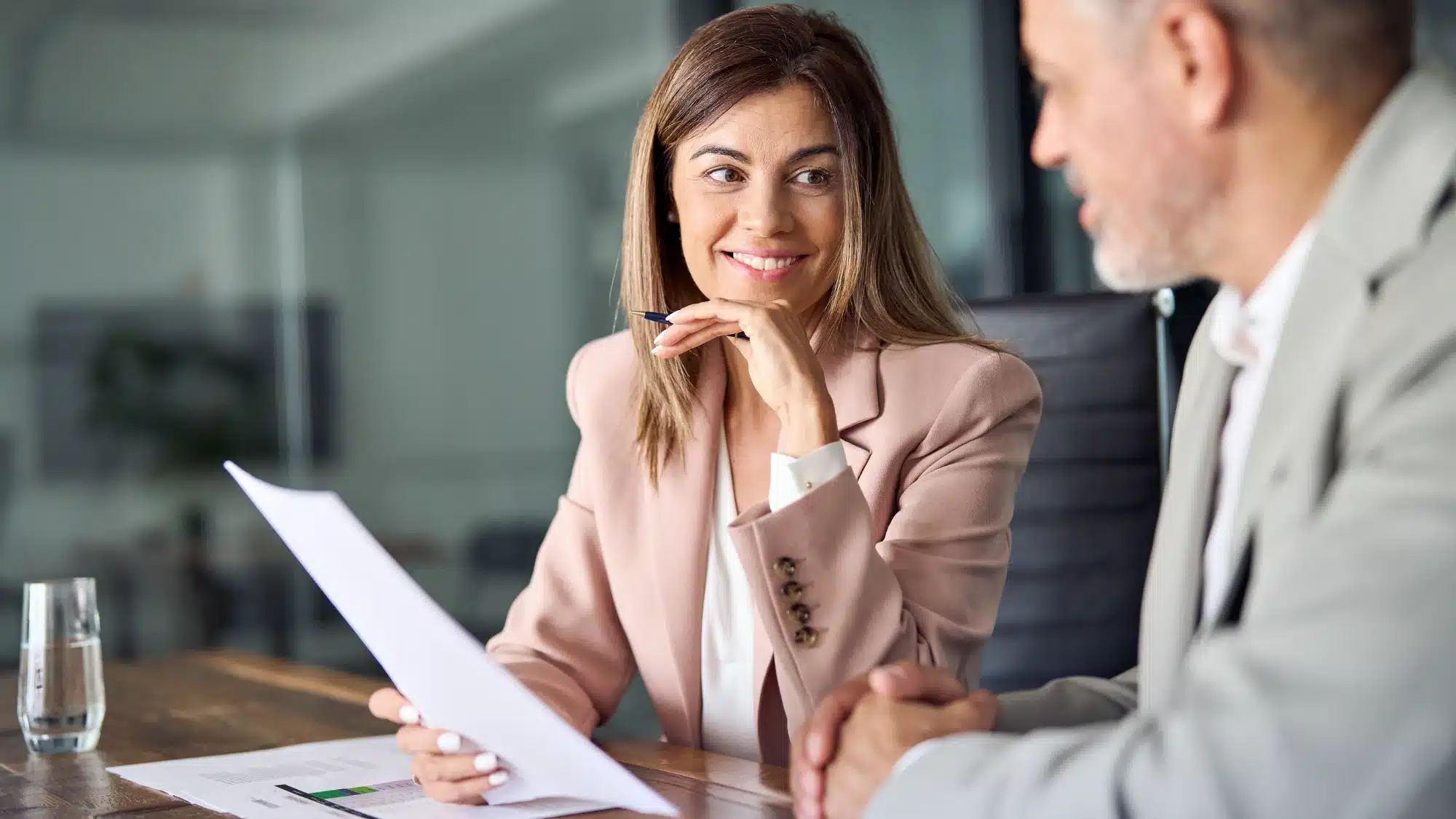 Happy employees working together in a modern office space