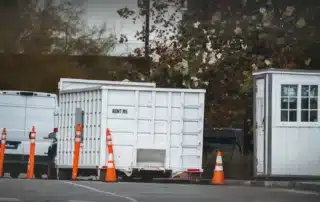 A large rented dumpster in Chester CT, showcasing its size and usage duration.
