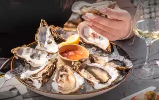 Fresh oysters served in Go Fish seafood restaurant plate
