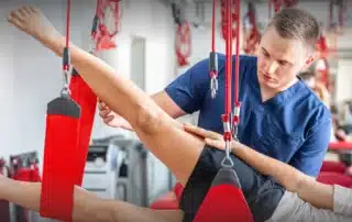 Athletes improving performance through Redcord Physical Therapy exercises