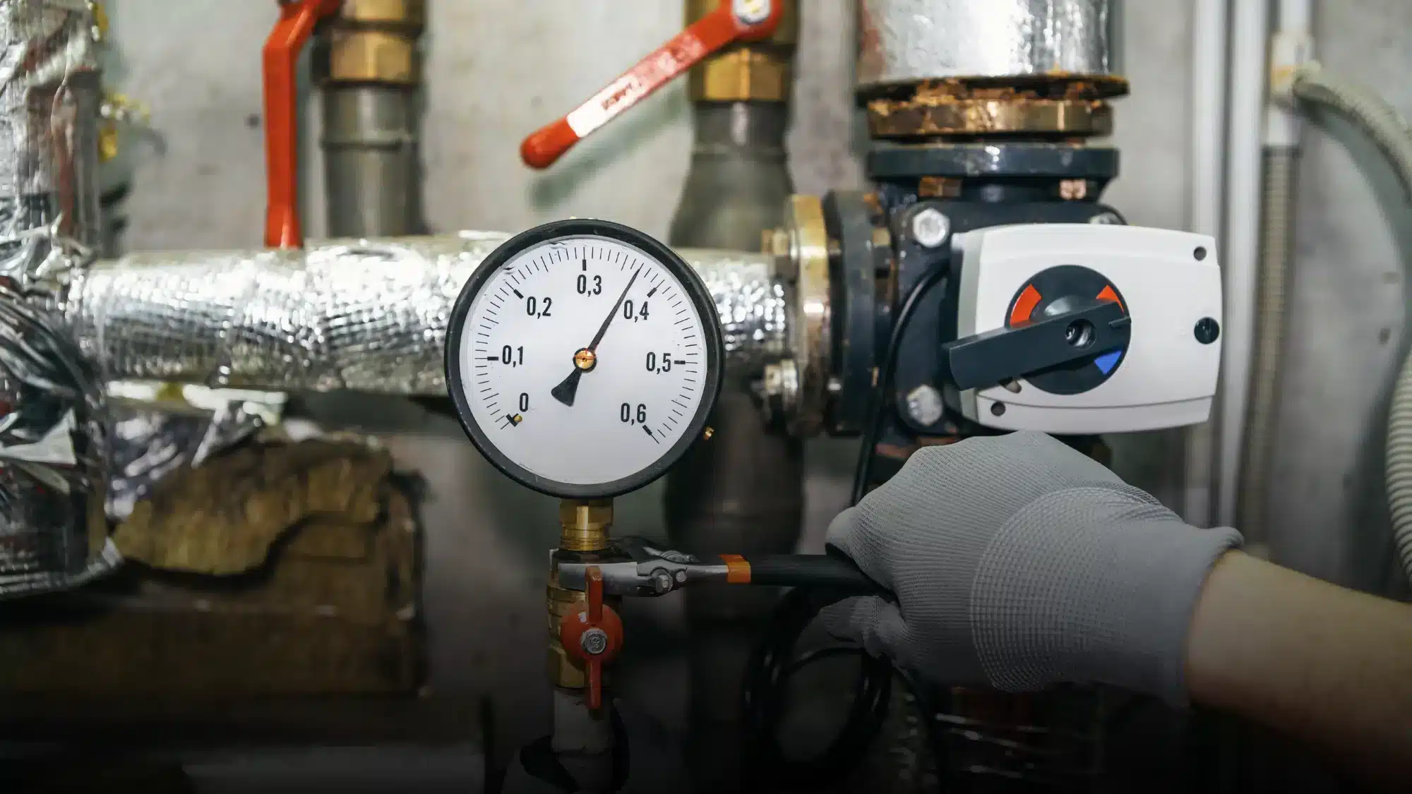 A technician performing well pump repair in Stafford CT home.