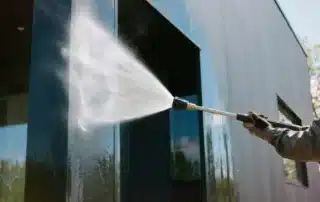 Expert pressure washing crew in Annapolis, MD cleaning house exterior