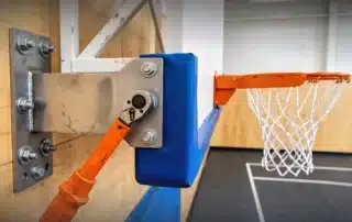 Basketball hoop backboard replacement process showcasing new backboard installation