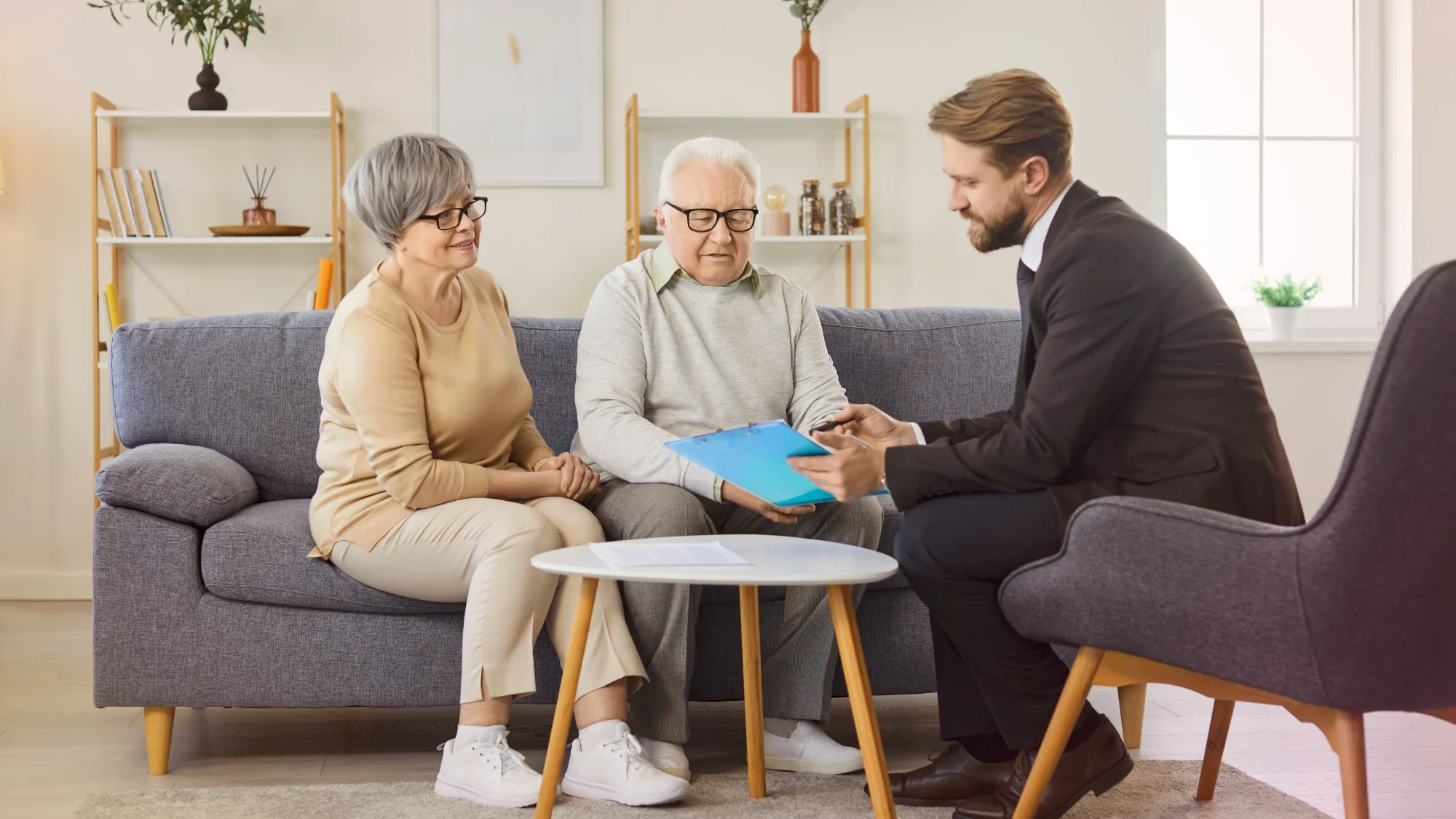 Medicare insurance agents guiding a client on enrollment timeline near Mystic, CT.