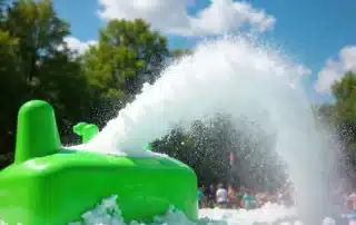 Colorful foam party setup with bubbles and participants enjoying